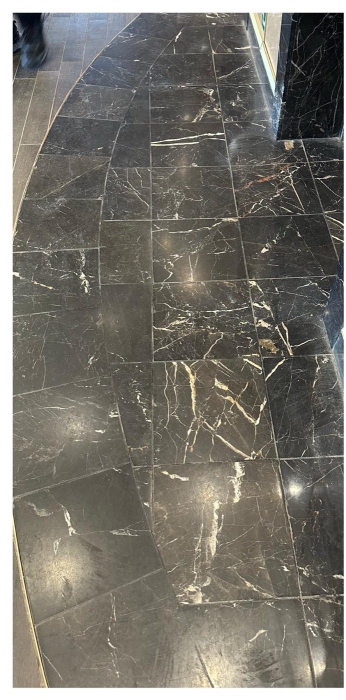 Marble lobby floor restoration — before